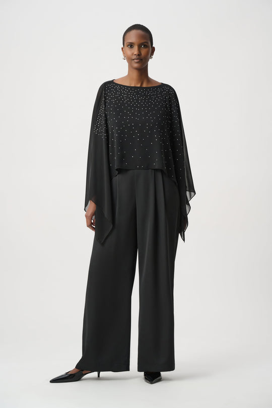 Black rhinestone poncho with layered tiers and cape-like draped sleeves