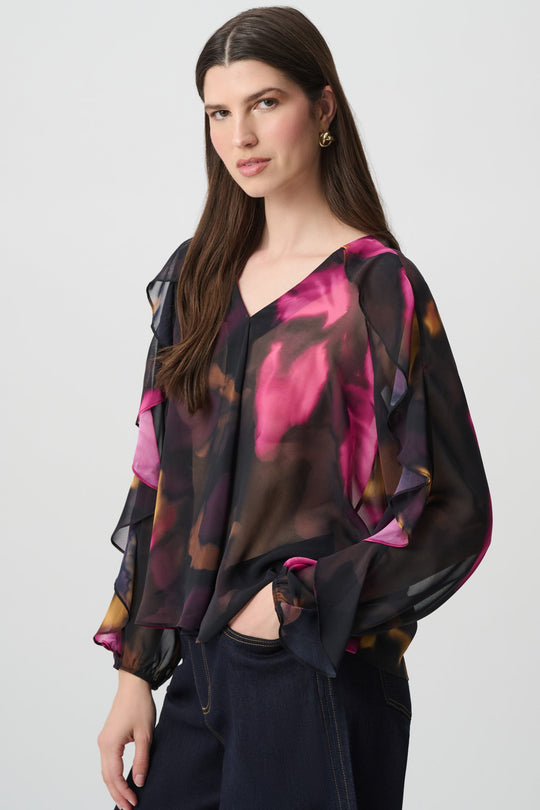 Joseph Ribkoff floral chiffon V-neck ruffle top in black and pink multi print on model
