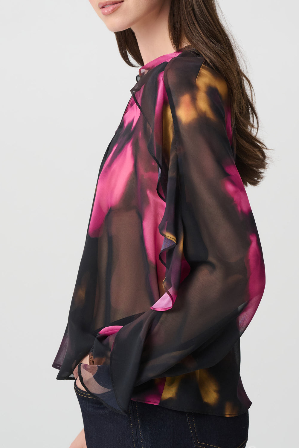 Joseph Ribkoff sheer black chiffon blouse with pink floral print and ruffle detail, side view