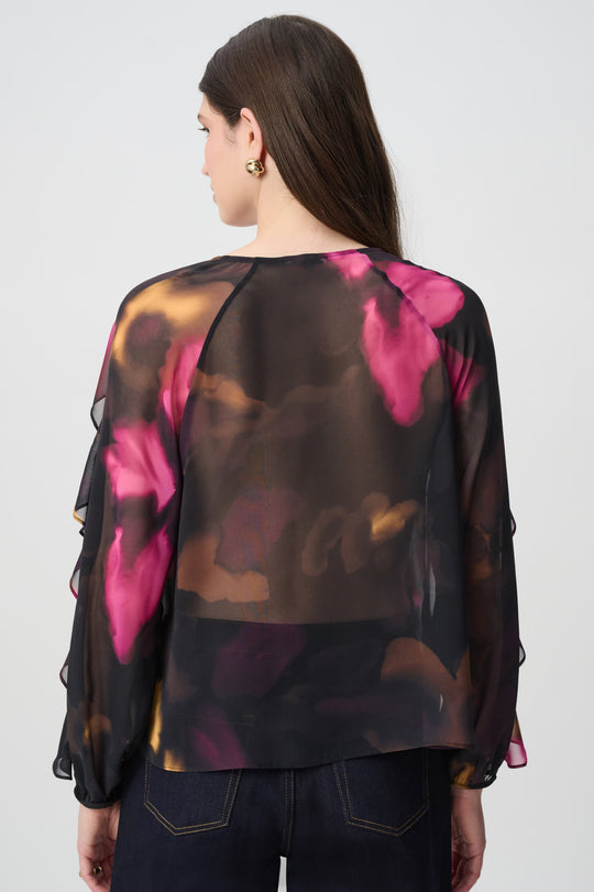 Joseph Ribkoff floral chiffon top in black and multi-color, back view on model