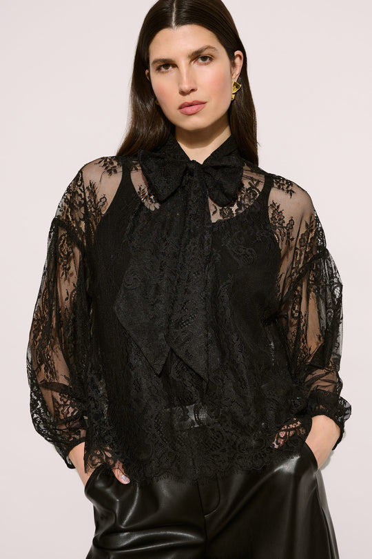 Joseph Ribkoff black lace bow neck blouse with sheer sleeves and camisole underlayer