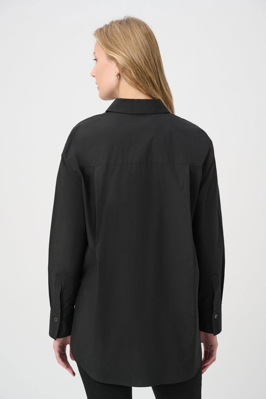 Black embroidered button-down shirt back view with collar and button cuffs