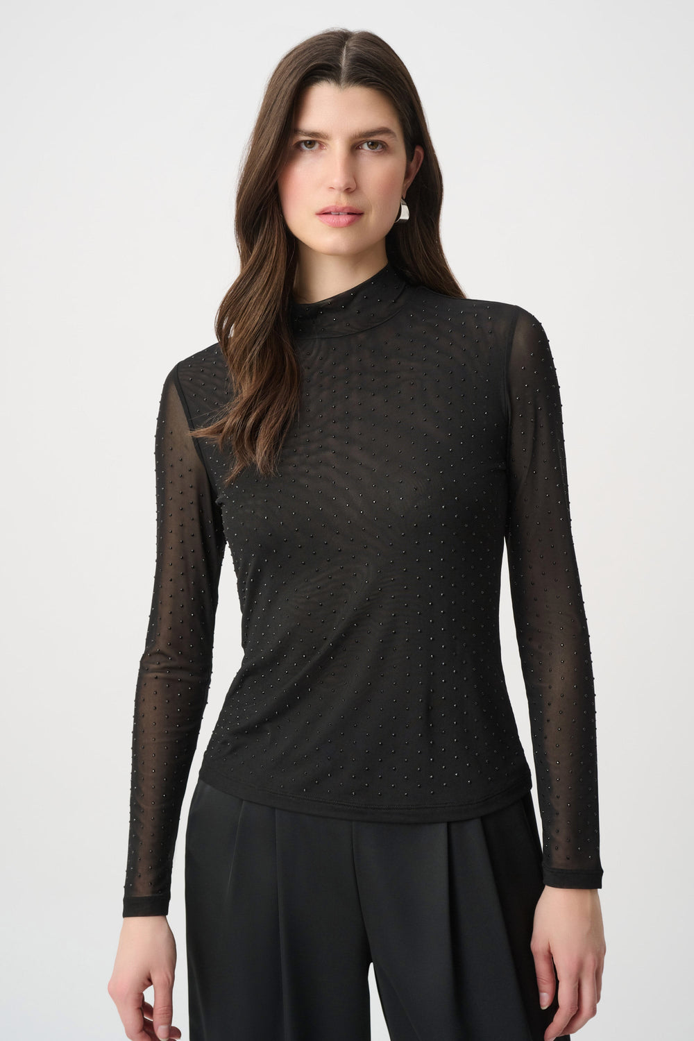 Black mesh long-sleeve top with rhinestone-like dot pattern and mock neck