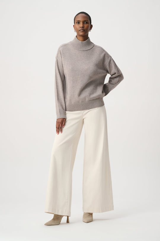Taupe turtleneck knit sweater with long sleeves and ribbed cuffs
