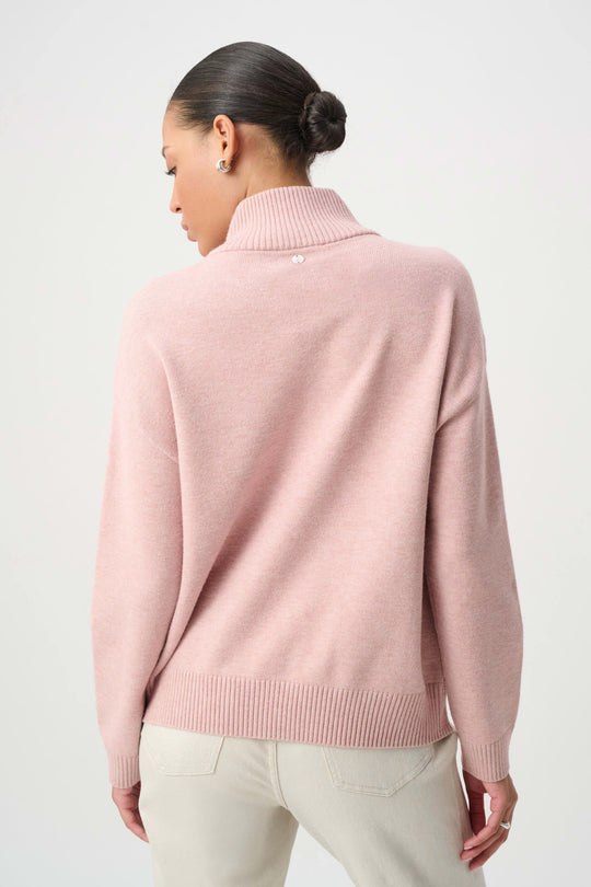 Soft blush embellished turtleneck sweater, back view with ribbed hem and cuffs