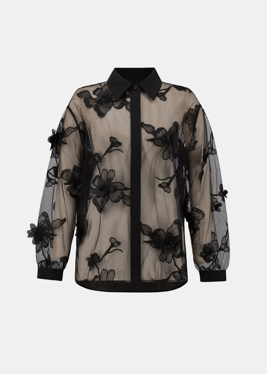 Sheer black blouse with floral appliqué, collar, and long sleeves