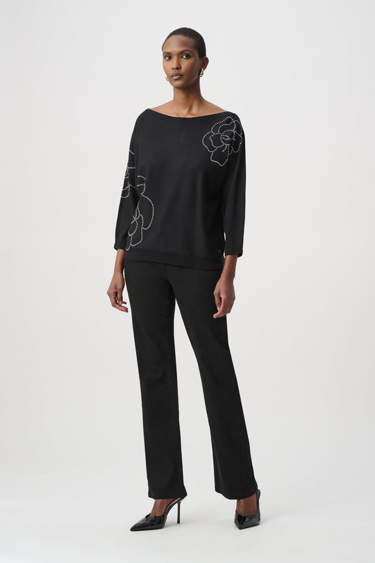 Black pullover sweater with embroidered rhinestone flowers, relaxed fit