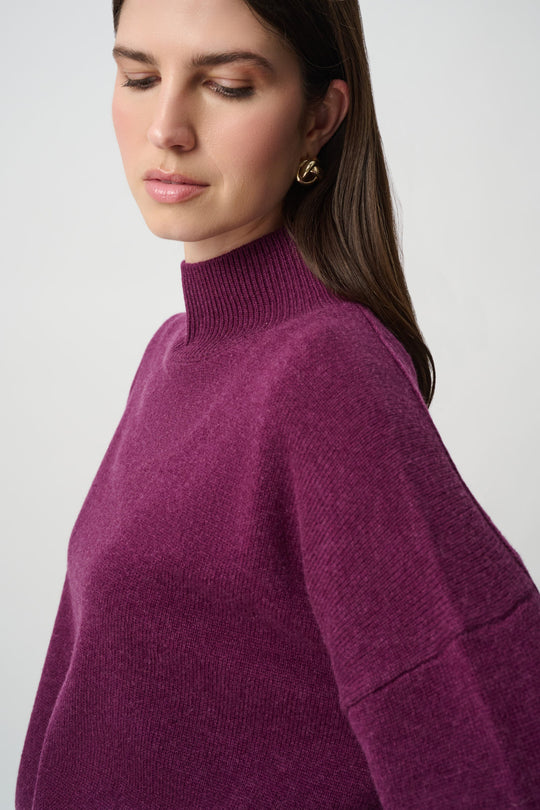 Joseph Ribkoff wool mock neck sweater in elderberry purple, worn by model