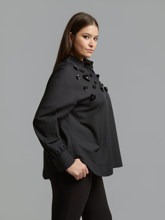 Black long-sleeve button shirt side view with black jet beaded cluster accents