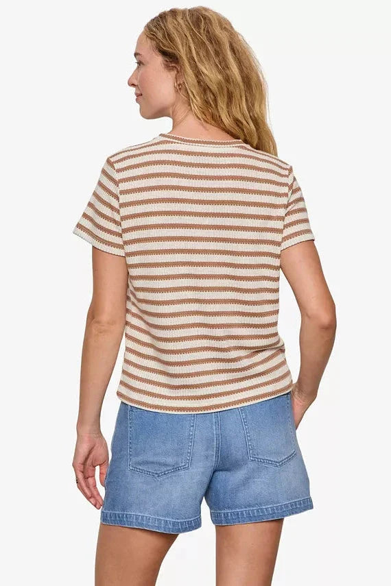 Brown and white striped short sleeve tee worn by model, back view showing textured fabric