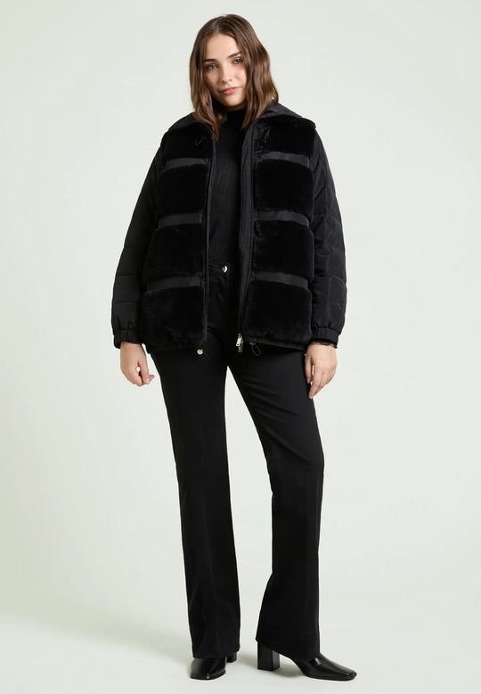Black plush-panel puffer jacket with stand collar, front zip, and long sleeves