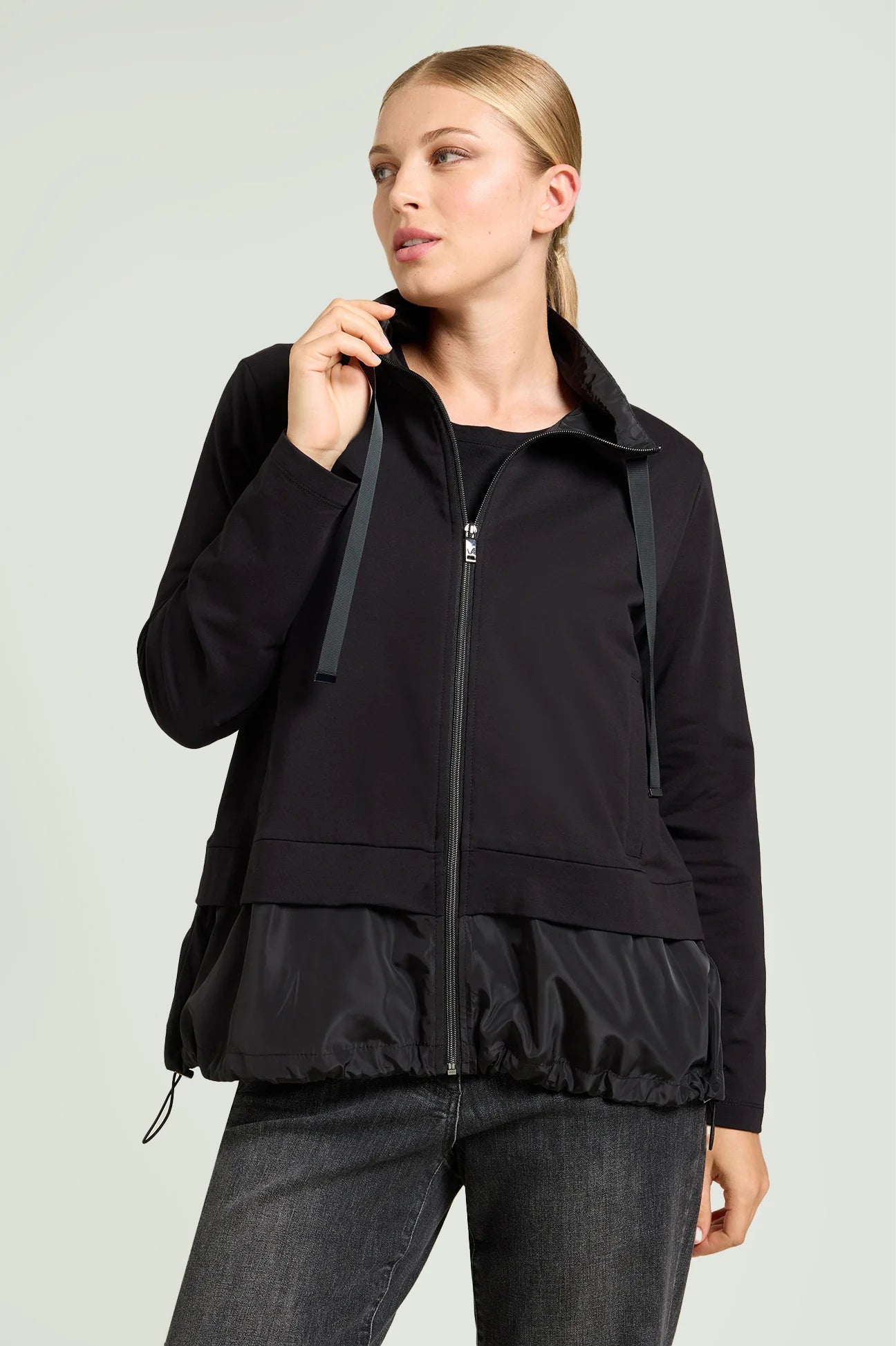 Front view of plus size Luisa Viola Zip Front Athleisure jacket with taffeta trim in Black