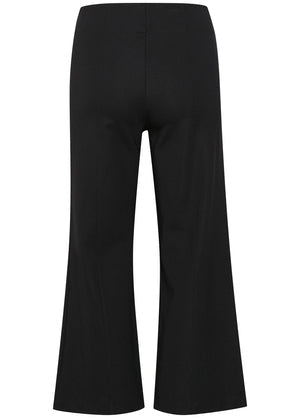 Black denim flare jeans with gold-tone chain embellishments on the front pockets, shown against a plain white background.