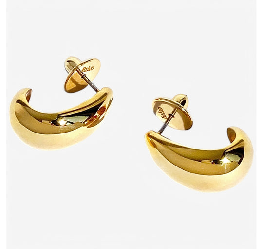 Small curved hoop earrings in gold finish with post backs displayed on white background