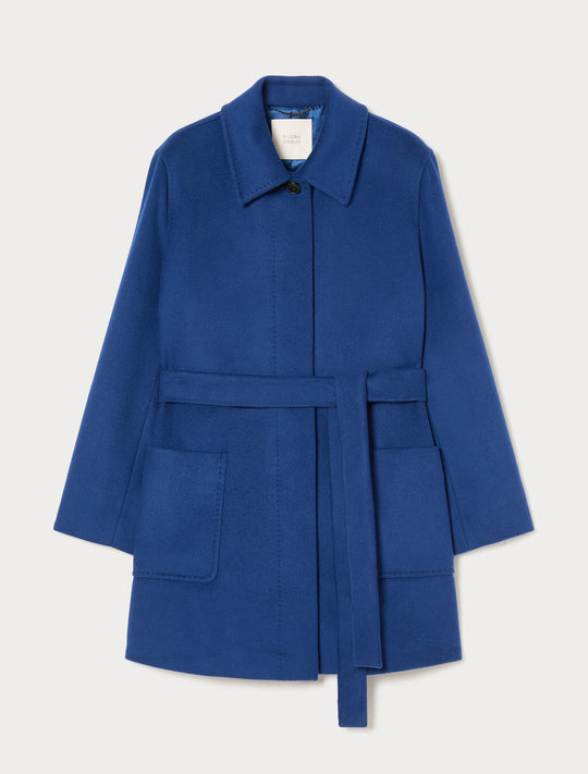 Bright blue wool short coat with self belt, patch pockets, and covered button placket, flat lay view