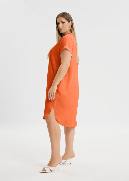 side view of Mat plus size polyester textured air-wash V-neck Short Sleeve Dress in coral