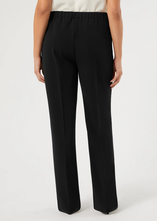 back view of plus size Marina Rinaldi Rapsodia Comfort Fit Pull On Pant in Black