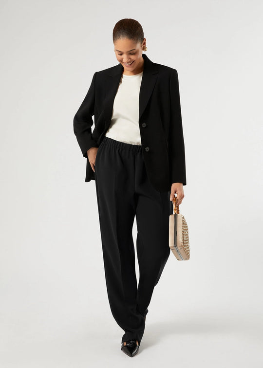 front view of plus size Marina Rinaldi Rapsodia Comfort Fit Pull On Pant in Black