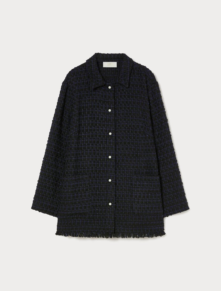 Oversized dark tweed jacket with pearl buttons, fringed hem, and patch pockets, front view