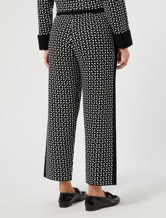 Black-and-white printed viscose pants with straight wide legs, cropped ankle length
