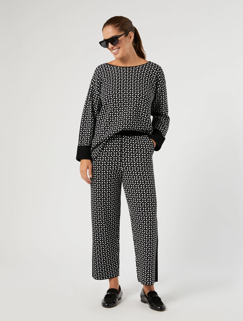 Black-and-white patterned viscose pants with relaxed straight legs, cropped ankle length