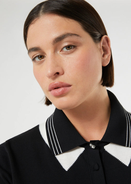 close up front view of plus size Marina Rinaldi Finito Double Contrast Collar Polo Sweater in Black and Off White