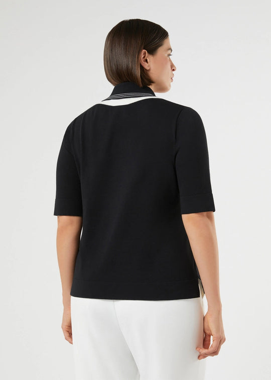 back view of plus size Marina Rinaldi Finito Double Contrast Collar Polo Sweater in Black and Off White