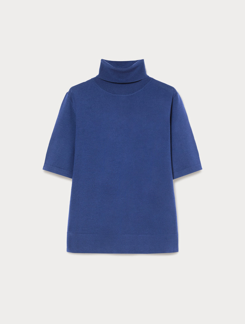 Short sleeve turtleneck knit top in solid blue, flat lay front view