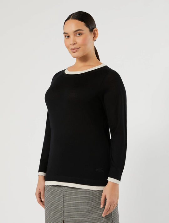 Black long-sleeve crew neck pullover with white trim around cuffs and hem
