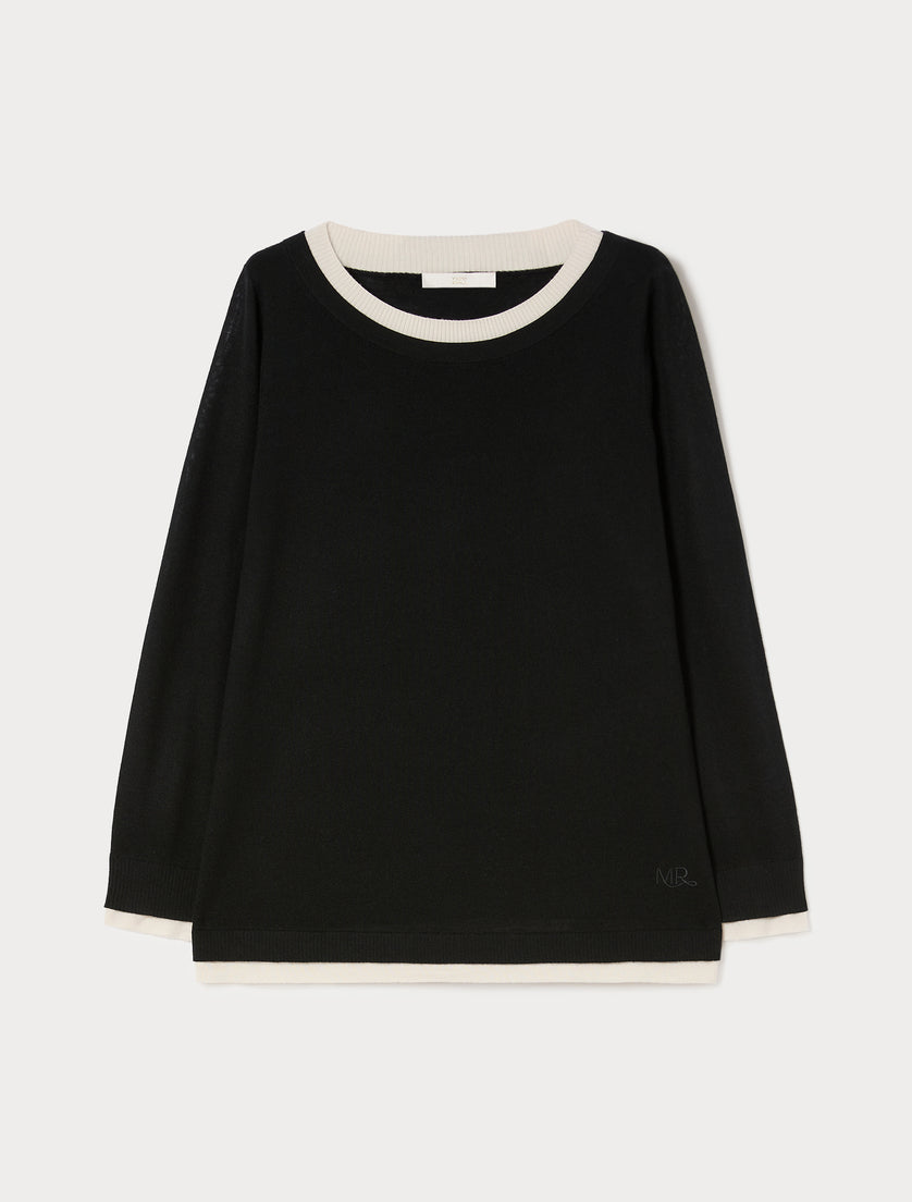Black long-sleeve crewneck pullover with contrast cream ribbed collar and hem trim, flat lay view