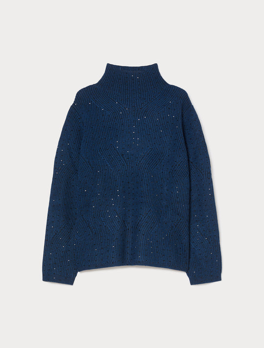 Cable-knit mock neck sweater with scattered metallic studs, laid flat, front view