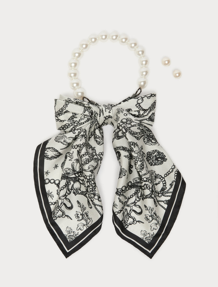 Pearl choker necklace with black and white printed silk bow and matching pearl stud earring