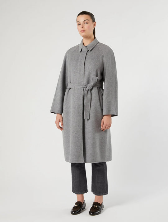 3/4 length wool coat in medium grey, front view, fly front with self belt tie