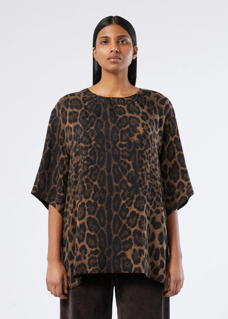front view of plus size Marina Rinaldi Oscuro Twill Cupro Animal Print Top in Black Animal