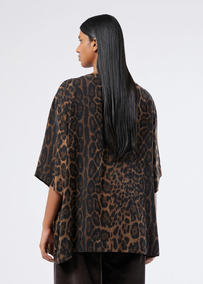 back view of plus size Marina Rinaldi Oscuro Twill Cupro Animal Print Top in Black Animal