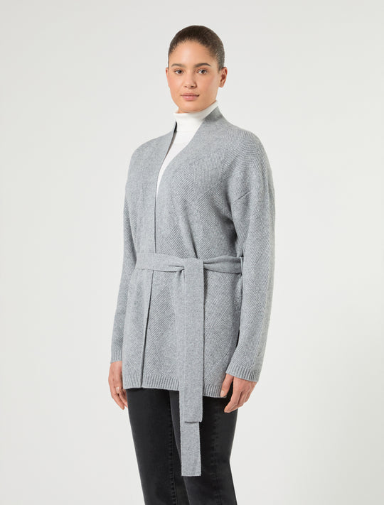 Open-front belted knit cardigan with diamond texture pattern, three-quarter view on model