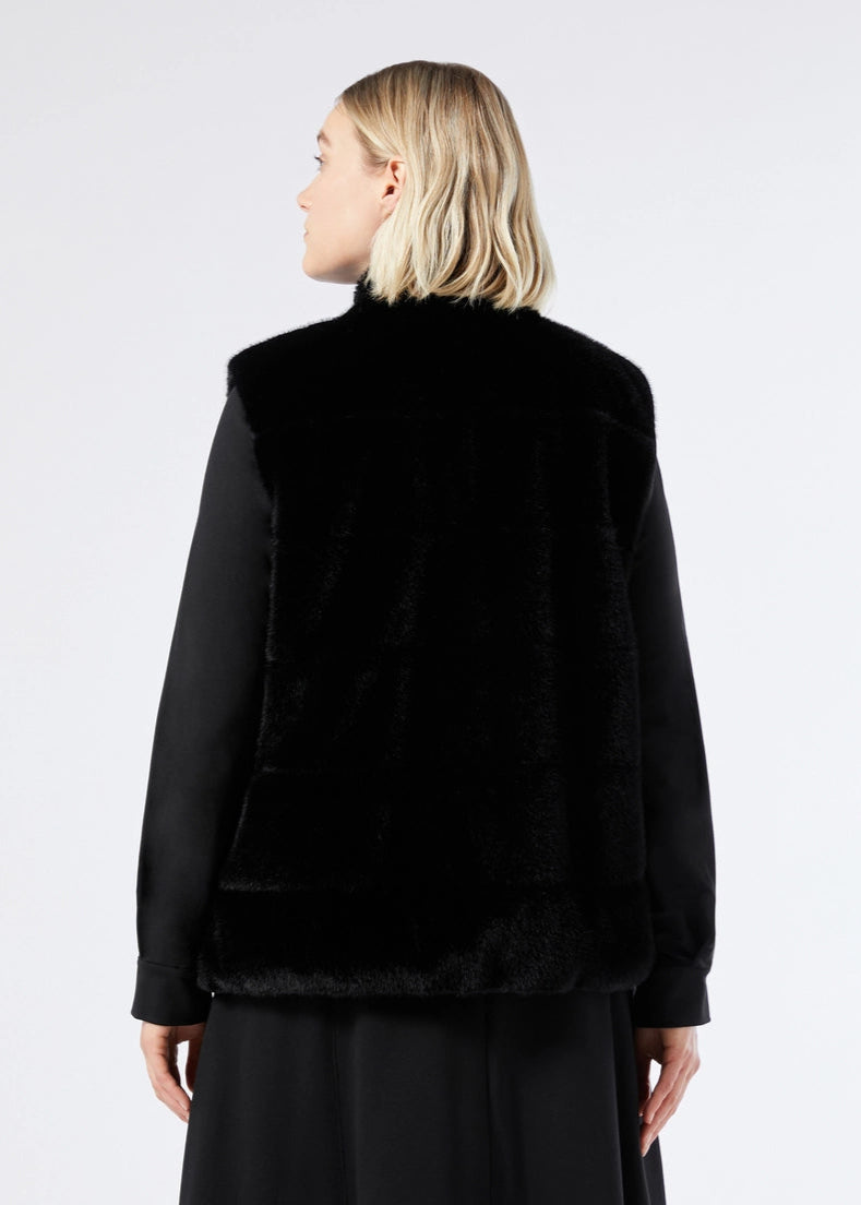 back view of plus size Marina Rinaldi Disegno Faux Fur Reversible Vest in Black