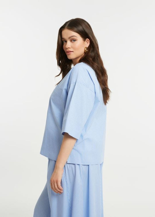 side view of plus size Mat Pinstriped Popover Short Sleeve Top with Split Neck in Blue