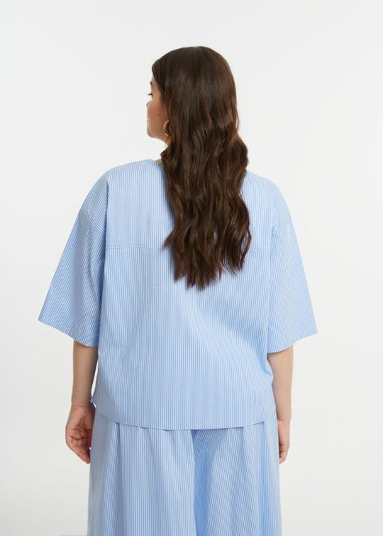 back view of plus size Mat Pinstriped Popover Short Sleeve Top with Split Neck in Blue