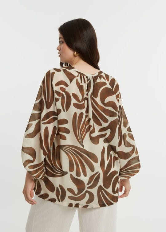 back view of plus size Mat Print Blouse with Split Neck in Caramel