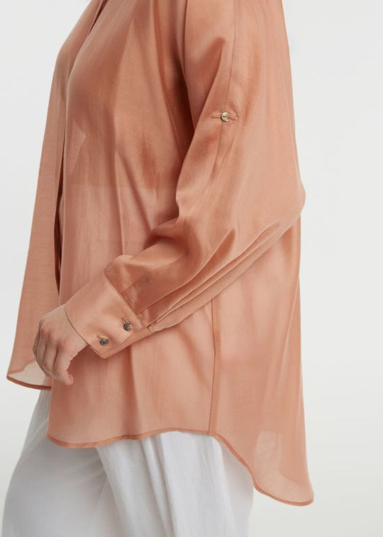 close up side view of plus size Mat Long Sleeve Button Front Oversize Sheer Shirt in Peach