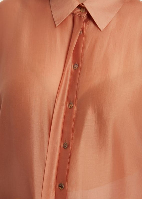 close up front view of plus size Mat Long Sleeve Button Front Oversize Sheer Shirt in Peach