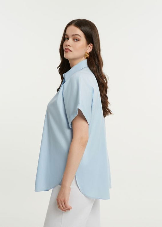 side view of plus size Mat Short Sleeve Button front Stretch Cotton Shirt in Light Blue