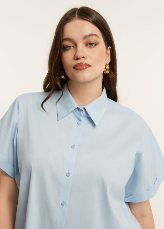 close up front view of plus size Mat Short Sleeve Button front Stretch Cotton Shirt in Light Blue