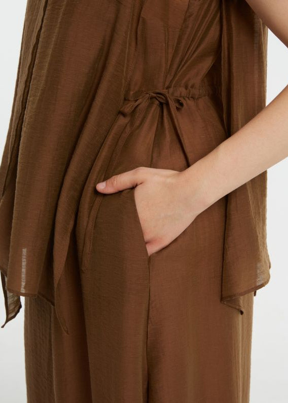 close up side view of plus size Mat Sleeveless Layered Uneven Hem Dress in Chocolate