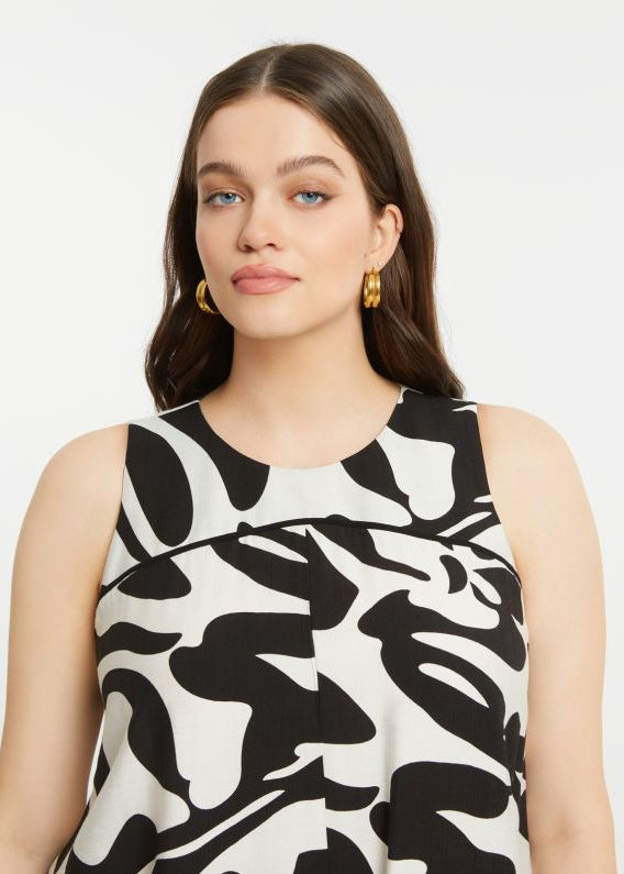 close up front view of plus size Mat Print Sleeveless A Line Dress Midi Length in Black White