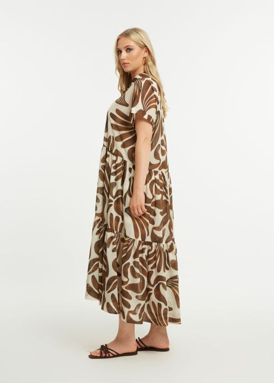 side view of plus size Mat Print Short Sleeve Shirt Dress with Ruffle Hem Midi Length in Caramel