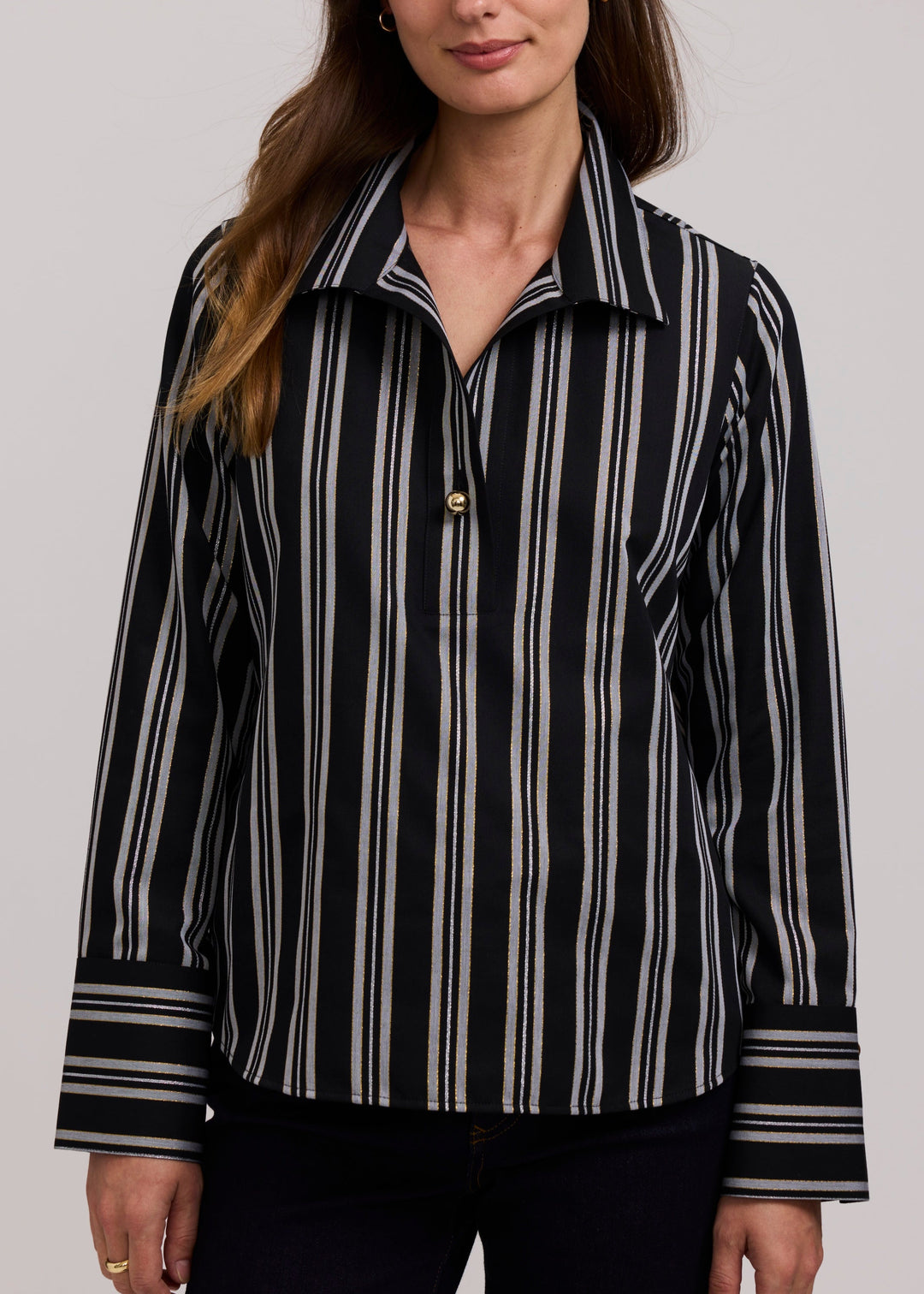 Women’s black multi vertical stripe popover shirt with long sleeves and button-front collar