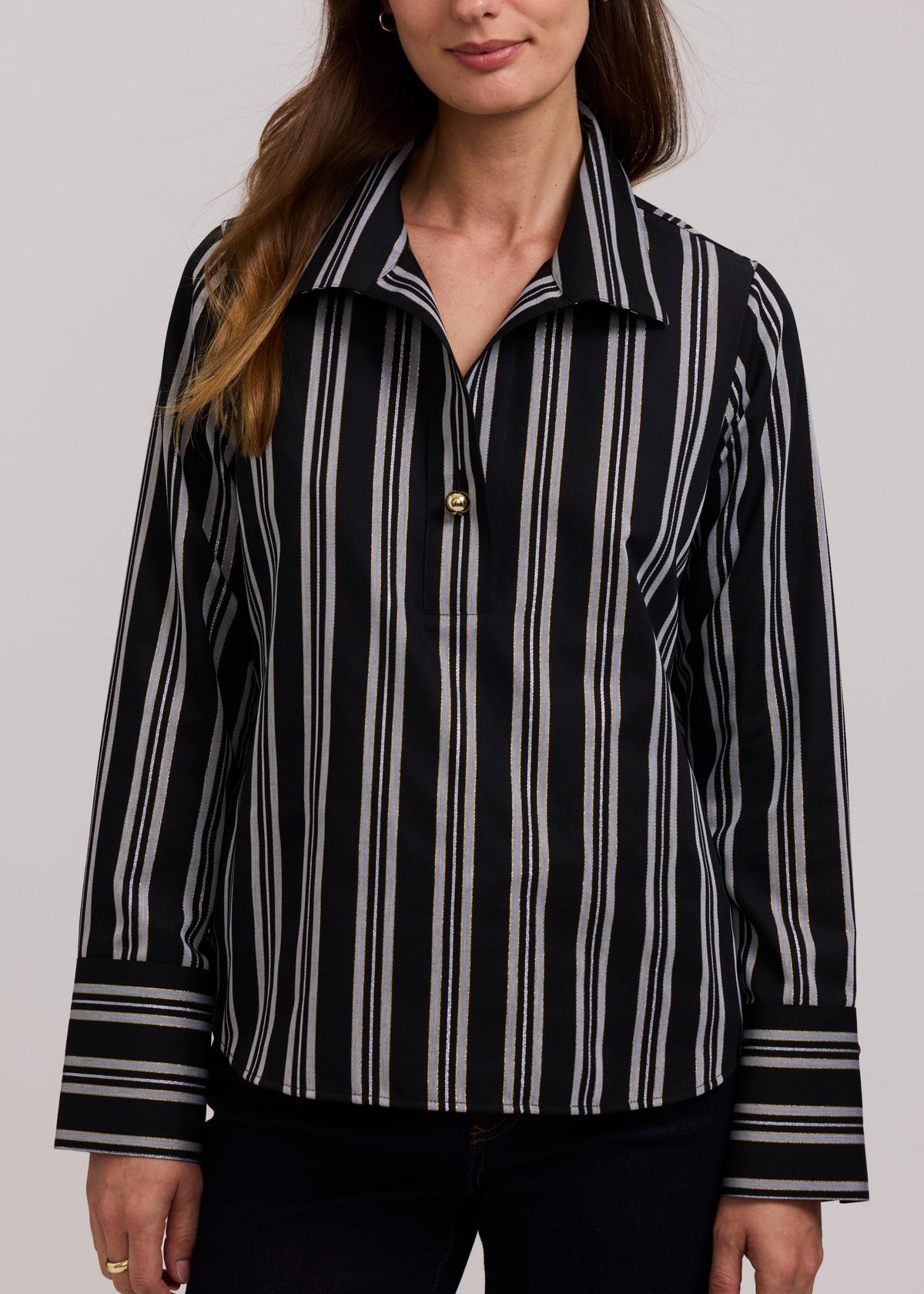 Women’s black multi vertical stripe popover shirt with long sleeves and button-front collar