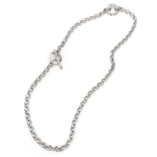 Silver chain necklace with toggle clasp closure laid flat on white background